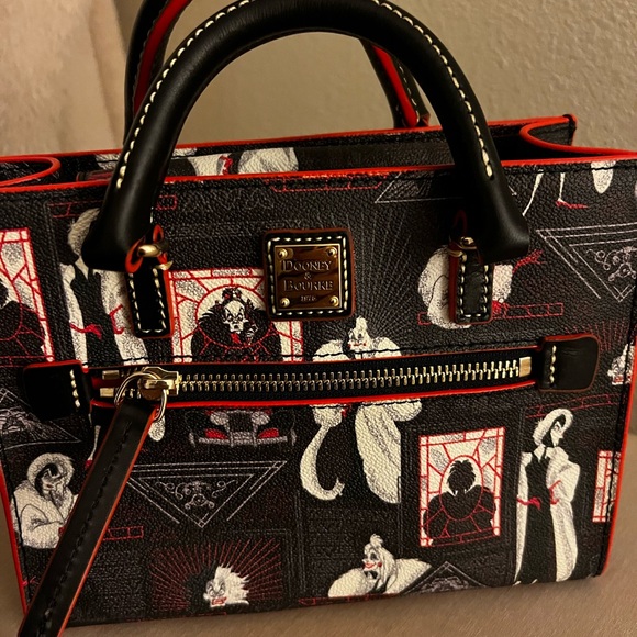 Dooney & Bourke Handbags - Dooney & Bourke Disney Black and White Satchel with Red Accents